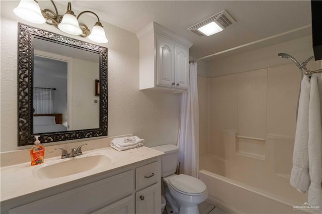 104 E Parade Dr Unit 12, South Padre Island, TX 78597 - full bathroom with vanity, shower / bathtub combination with curtain, and toilet