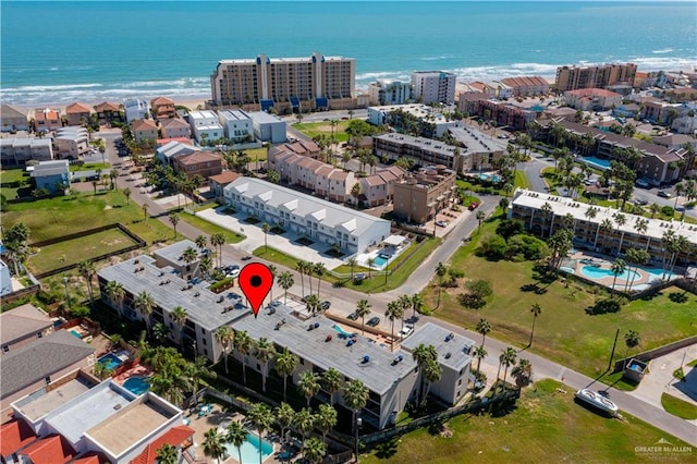 104 E Parade Dr Unit 12, South Padre Island, TX 78597 - birds eye view of property featuring a water view and a beach view