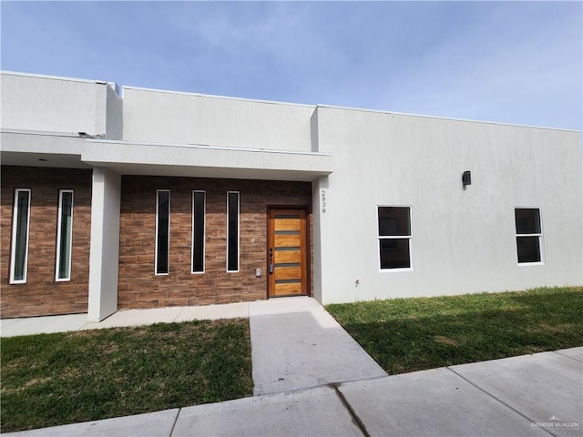 2838 Allen Dr, Edinburg, TX 78539 - property entrance with a lawn