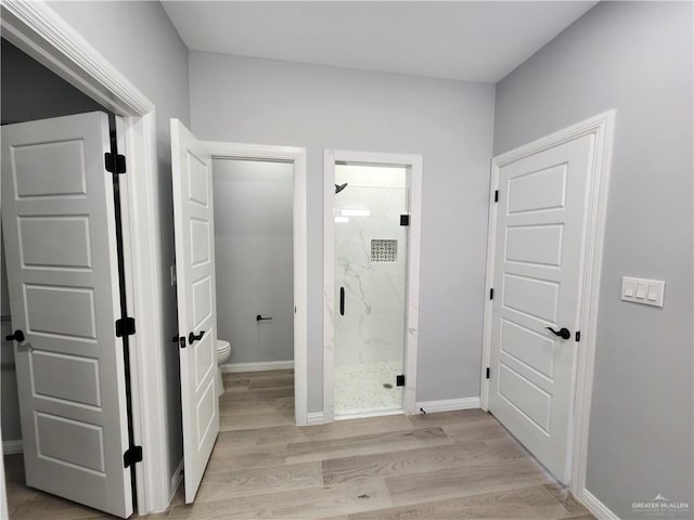 2838 Allen Dr, Edinburg, TX 78539 - hallway with light wood finished floors and baseboards