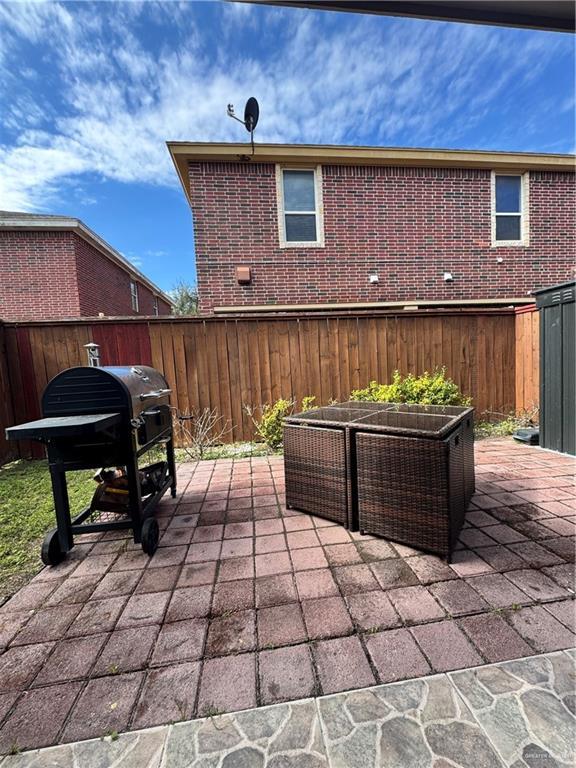 view of patio with a grill