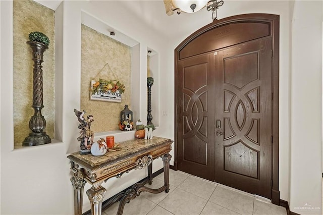 view of tiled foyer entrance