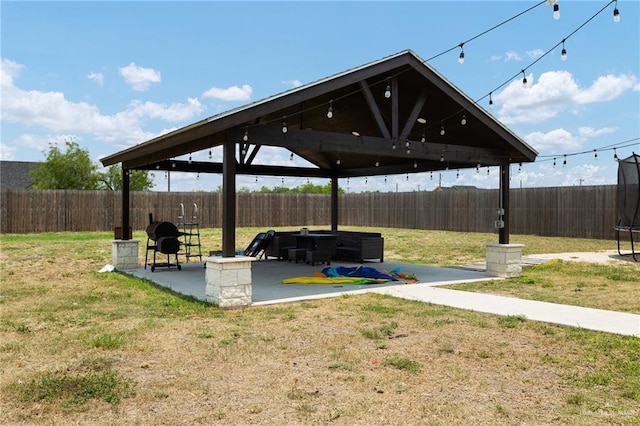 6317 Cardiff Ave, Edinburg, TX 78542 - view of yard featuring a gazebo, a trampoline, and a patio area