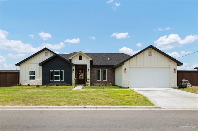 6317 Cardiff Ave, Edinburg, TX 78542 - view of front of home featuring board and batten siding, an attached garage, concrete driveway, and a shingled roof