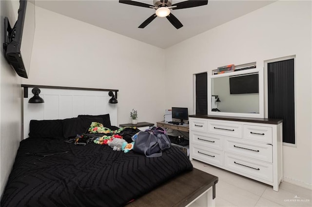 6317 Cardiff Ave, Edinburg, TX 78542 - bedroom with light tile patterned floors, a ceiling fan, and a desk