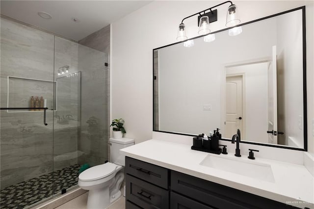 6317 Cardiff Ave, Edinburg, TX 78542 - bathroom with a shower stall, toilet, and vanity