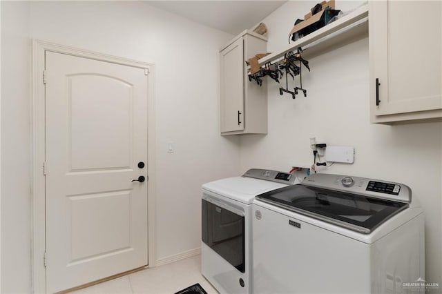 6317 Cardiff Ave, Edinburg, TX 78542 - laundry area featuring washer and clothes dryer, cabinet space, and light tile patterned flooring