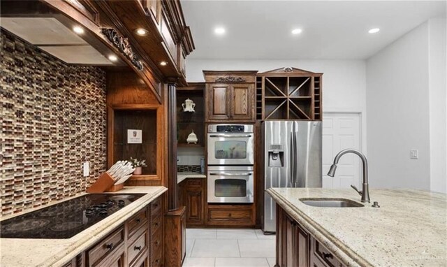 326 W Mile 11 N, Weslaco, TX 78599 - bar featuring beverage cooler, decorative backsplash, a bar, and wood finished floors
