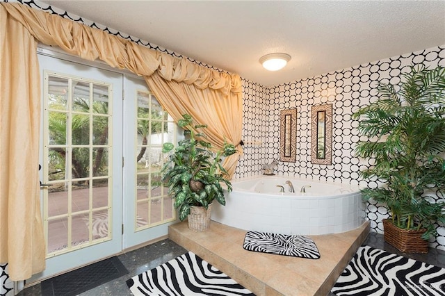 bathroom featuring a relaxing tiled tub