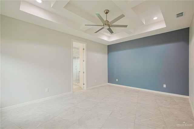 unfurnished room featuring recessed lighting, a ceiling fan, visible vents, baseboards, and a raised ceiling