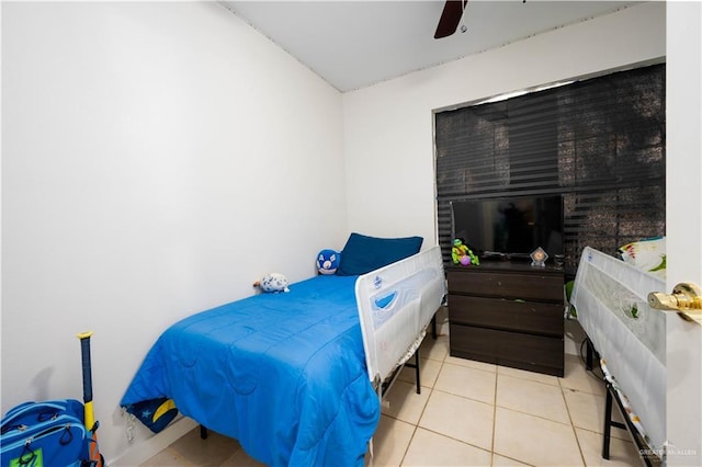 275 Violeta St, San Benito, TX 78586 - bedroom featuring light tile patterned flooring and ceiling fan