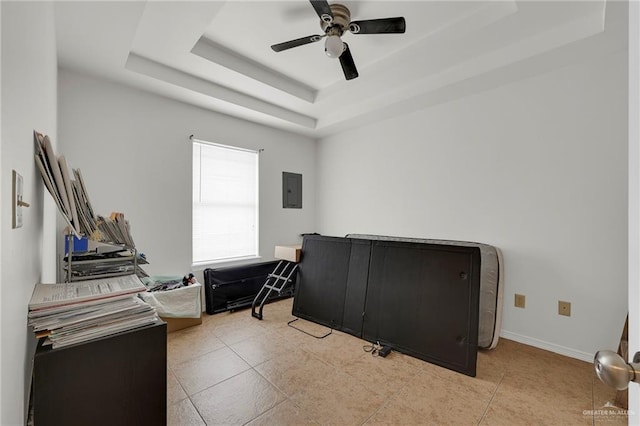 115 W Albatross Ave, Pharr, TX 78577 - home office featuring ceiling fan, electric panel, tile patterned flooring, baseboards, and a tray ceiling