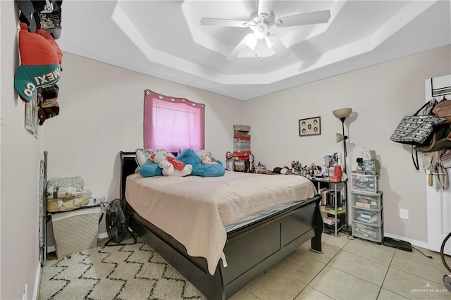 115 W Albatross Ave, Pharr, TX 78577 - bedroom with tile patterned flooring, a ceiling fan, and a raised ceiling