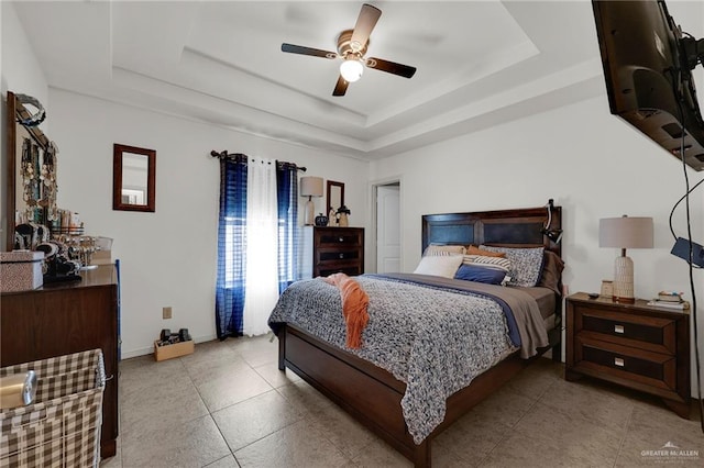 115 W Albatross Ave, Pharr, TX 78577 - bedroom with a ceiling fan, a tray ceiling, and baseboards
