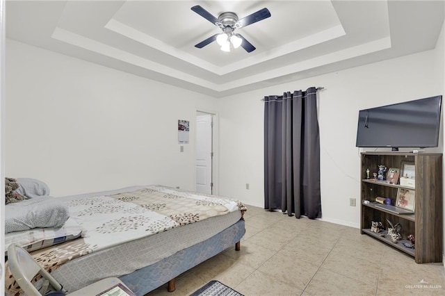 115 W Albatross Ave, Pharr, TX 78577 - tiled bedroom featuring a ceiling fan and a tray ceiling