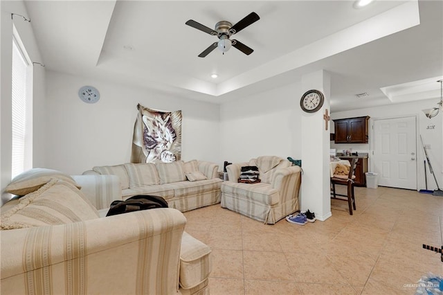 115 W Albatross Ave, Pharr, TX 78577 - living area featuring light tile patterned flooring, baseboards, recessed lighting, a tray ceiling, and a ceiling fan