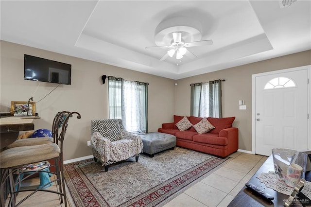 115 W Albatross Ave, Pharr, TX 78577 - living room with a raised ceiling, baseboards, a ceiling fan, and light tile patterned flooring