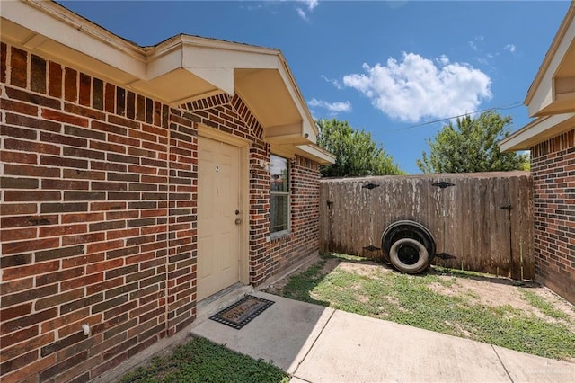 115 W Albatross Ave, Pharr, TX 78577 - property entrance featuring fence and brick siding