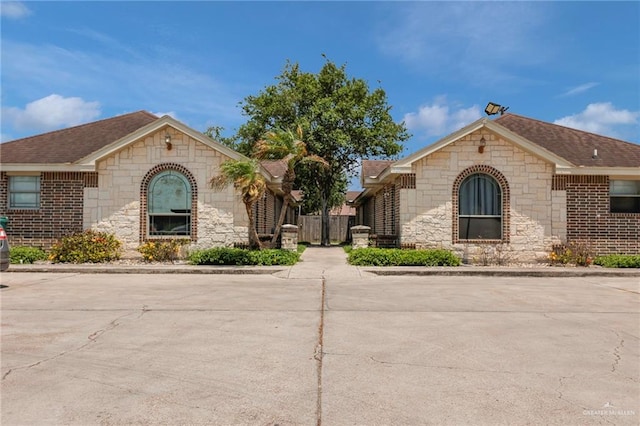 115 W Albatross Ave, Pharr, TX 78577 - ranch-style home with stone siding