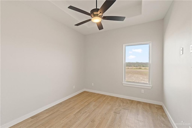 unfurnished room featuring ceiling fan and light hardwood / wood-style flooring