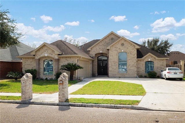 french country inspired facade with a garage and a front yard