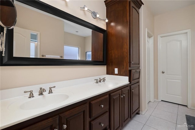 bathroom with vanity and tile patterned floors