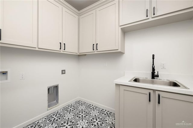 1003 Bette St, Pharr, TX 78577 - laundry room featuring cabinet space, hookup for an electric dryer, and hookup for a washing machine
