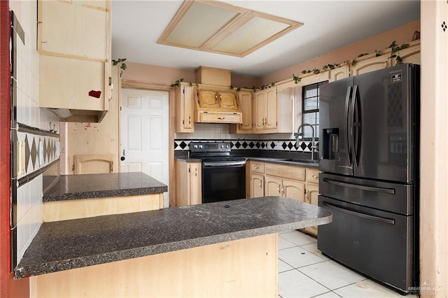 kitchen with black appliances, kitchen peninsula, ventilation hood, and sink