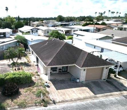 drone / aerial view with a residential view