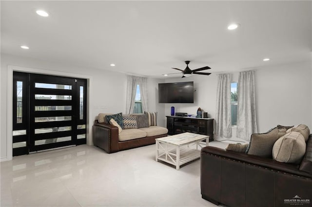 living room featuring ceiling fan