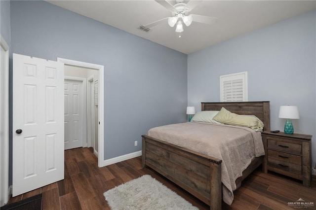 2513 Kings Dr, Edinburg, TX 78539 - bedroom with baseboards, wood finished floors, and a ceiling fan