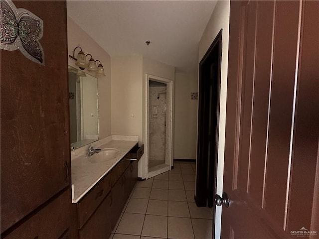 bathroom featuring tile patterned floors and vanity