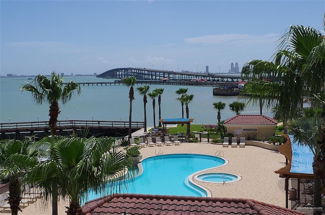 301 Houston St Unit 3303, Port Isabel, TX 78597 - community pool with a water view and a patio area
