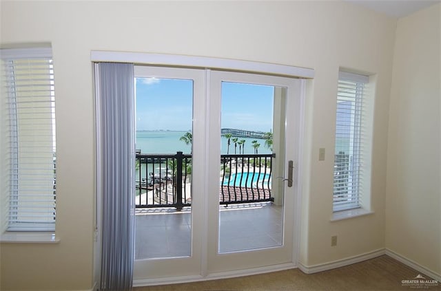 301 Houston St Unit 3303, Port Isabel, TX 78597 - entryway featuring a water view and carpet