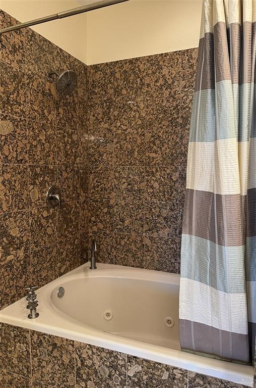 301 Houston St Unit 3303, Port Isabel, TX 78597 - full bathroom with a combined bath / shower with jetted tub