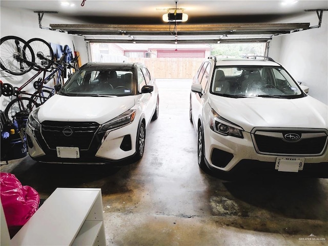 2513 Sandpiper Ave, Mcallen, TX 78504 - garage featuring a garage door opener