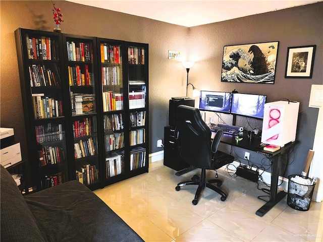 2513 Sandpiper Ave, Mcallen, TX 78504 - office space with a textured wall, bookshelves, and tile patterned floors