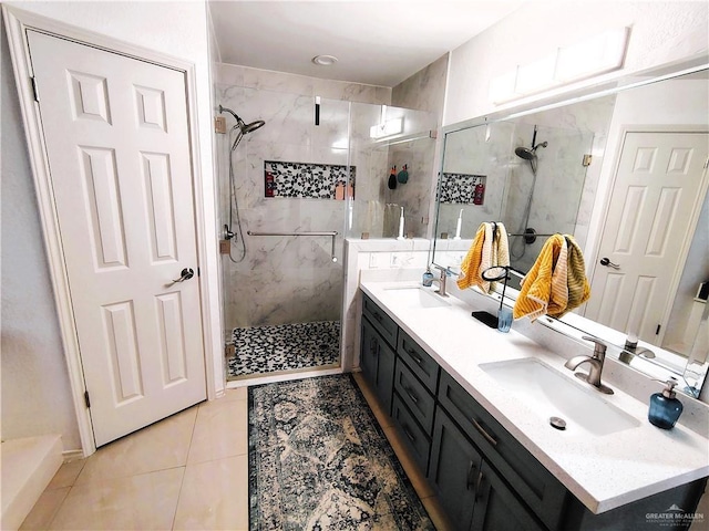 2513 Sandpiper Ave, Mcallen, TX 78504 - bathroom with a shower stall, tile patterned floors, and double vanity