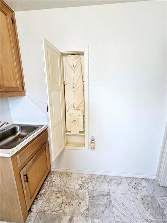 laundry room with sink