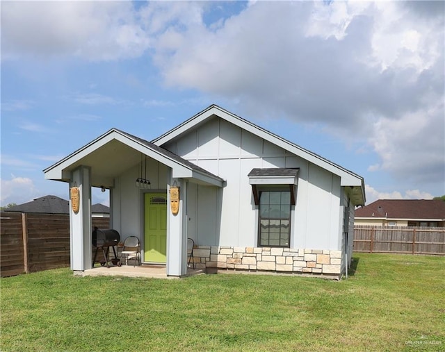 29082 Reynolds Dr, La Feria, TX 78559 - view of front of house with board and batten siding and stone siding