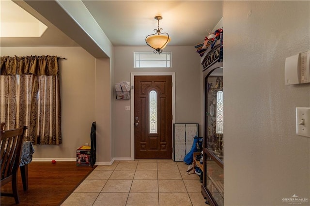 foyer with light hardwood / wood-style flooring