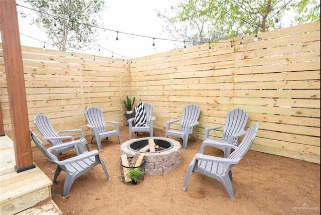 4509 Gardenia Ave, Mcallen, TX 78501 - view of patio / terrace featuring an outdoor fire pit