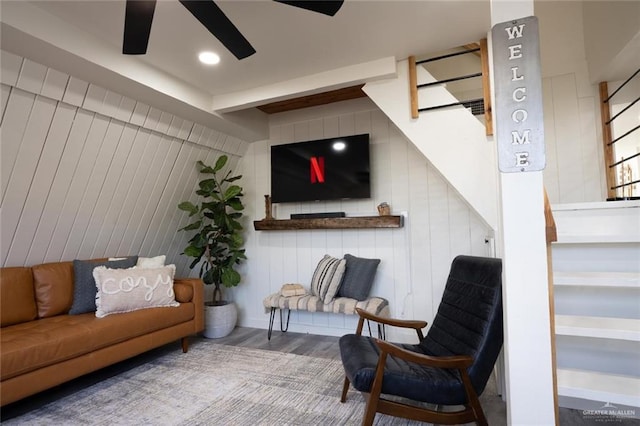 4509 Gardenia Ave, Mcallen, TX 78501 - living area with a ceiling fan, wood walls, and wood finished floors