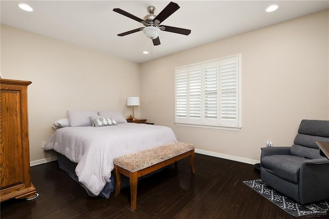 bedroom featuring ceiling fan and dark wood-type flooring