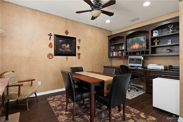 dining room with dark hardwood / wood-style floors and ceiling fan