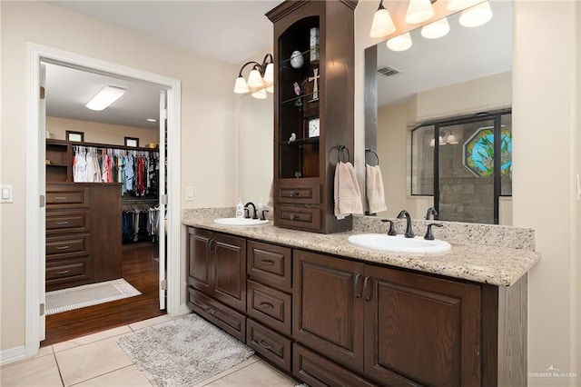 bathroom with hardwood / wood-style floors and vanity