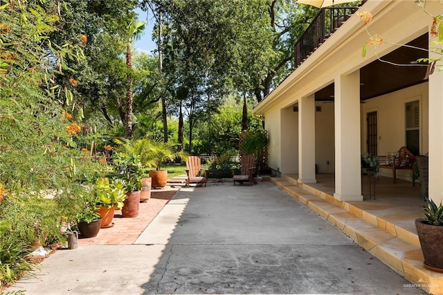 view of patio / terrace featuring a balcony