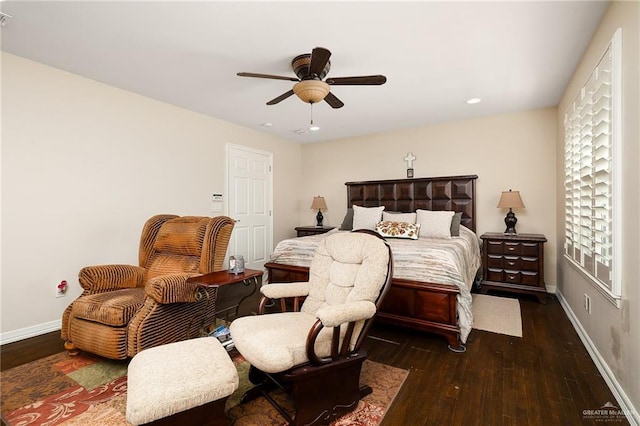 bedroom featuring ceiling fan and dark wood-type flooring