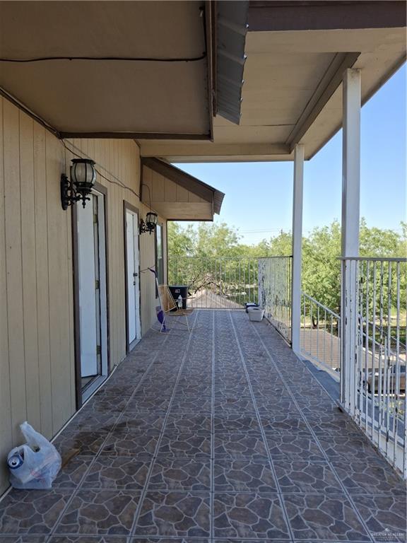 view of patio with a balcony