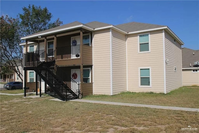 view of front of home with a front yard